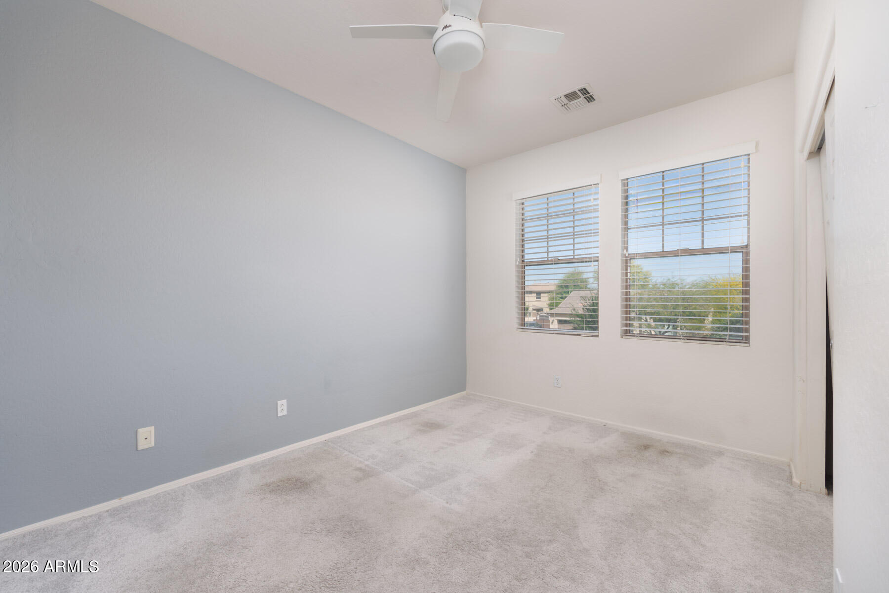 3167 East Powell Way Gilbert, AZ 85298 - Photo 24 of 39 an empty room with windows