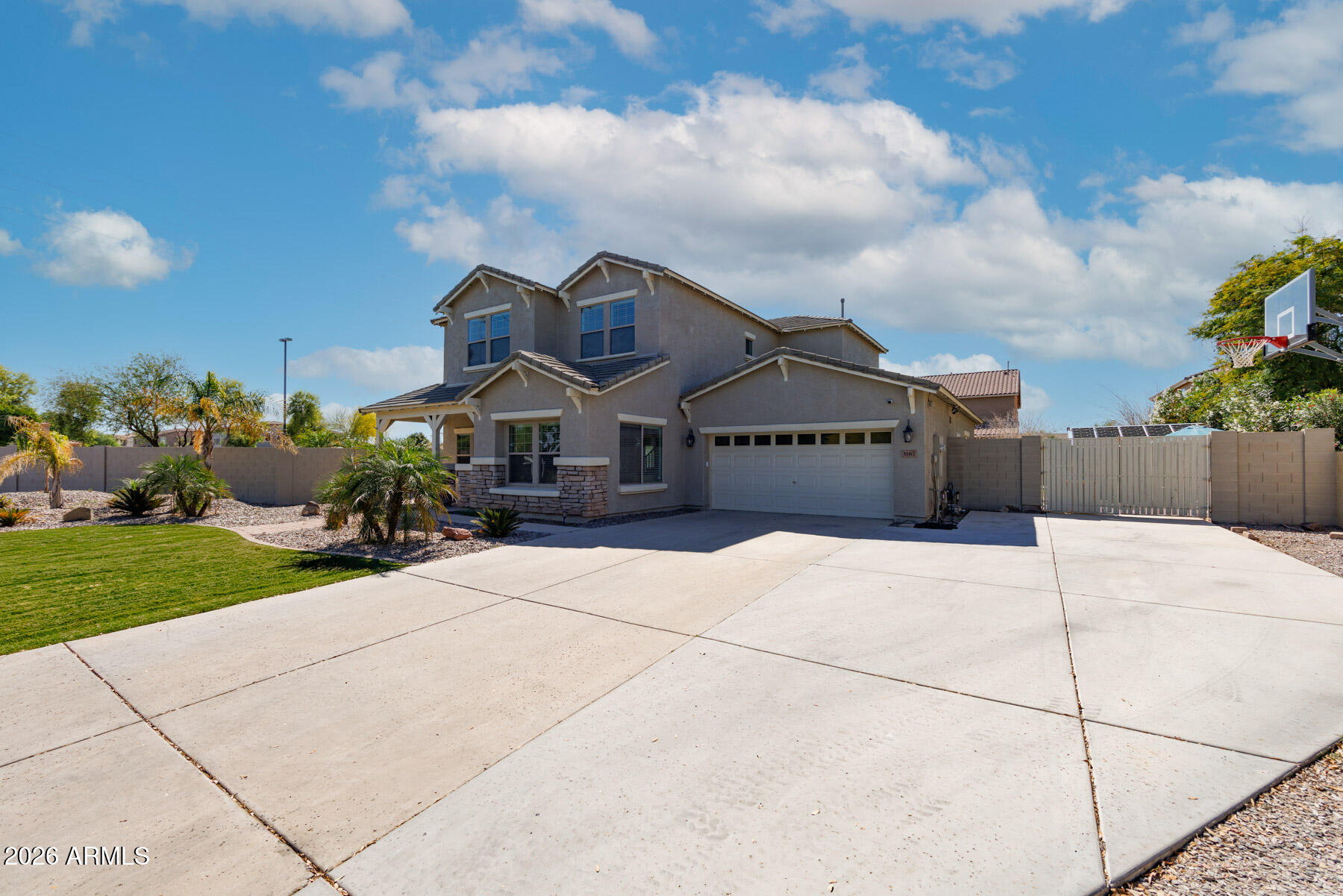 3167 East Powell Way Gilbert, AZ 85298 - Photo 29 of 39 a front view of a house with a yard