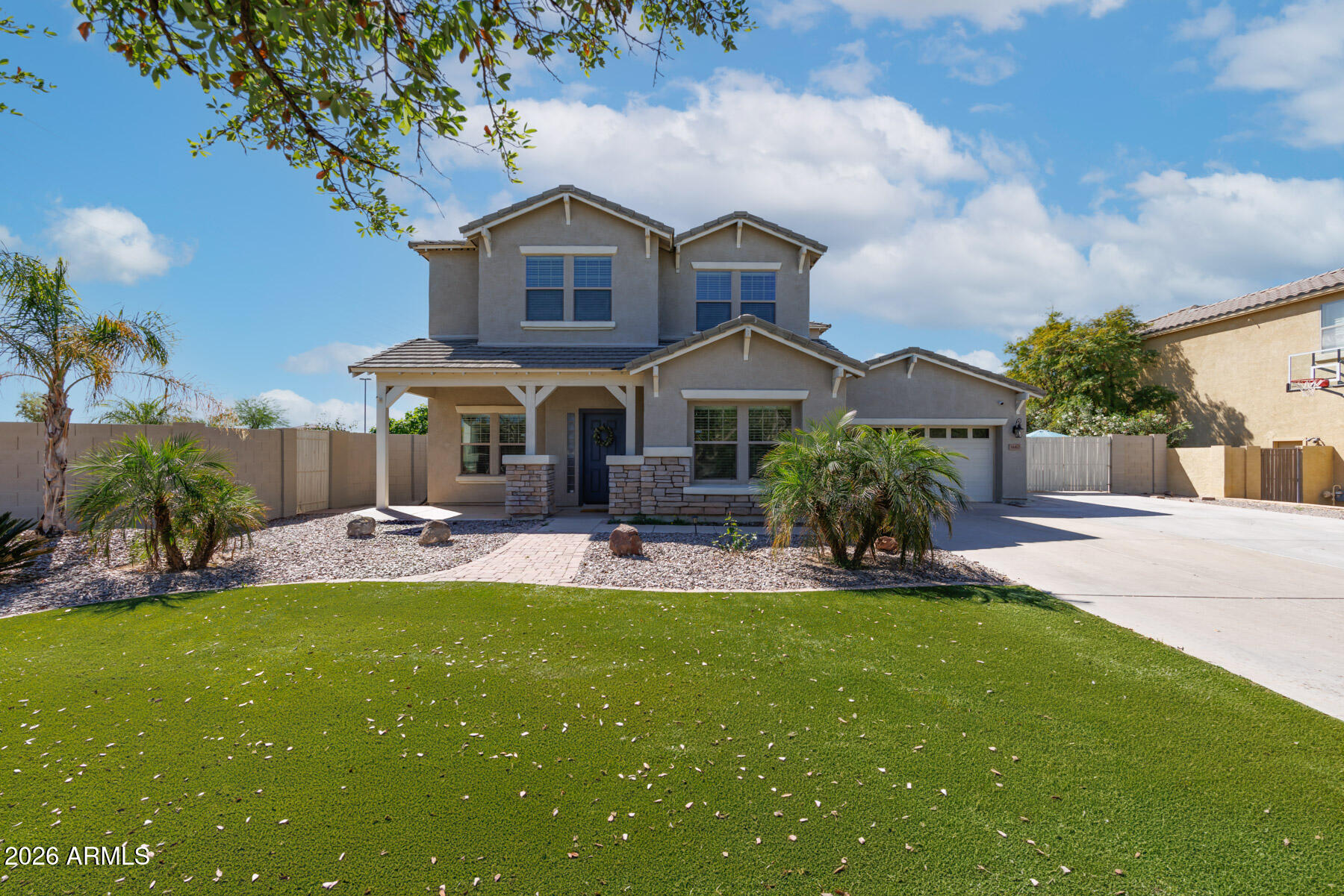 3167 East Powell Way Gilbert, AZ 85298 - Photo 30 of 39 a view of a house with a yard and sitting area