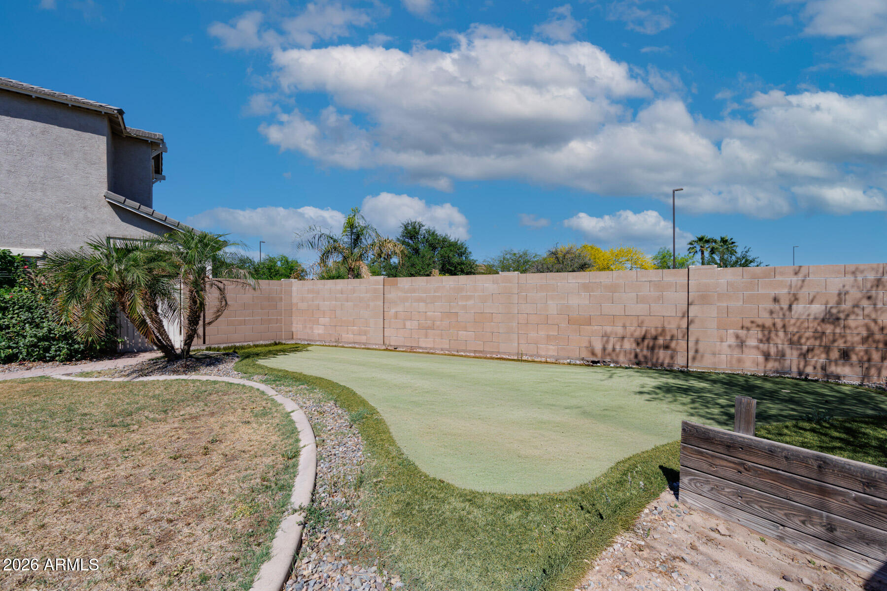 3167 East Powell Way Gilbert, AZ 85298 - Photo 34 of 39 a view of a backyard