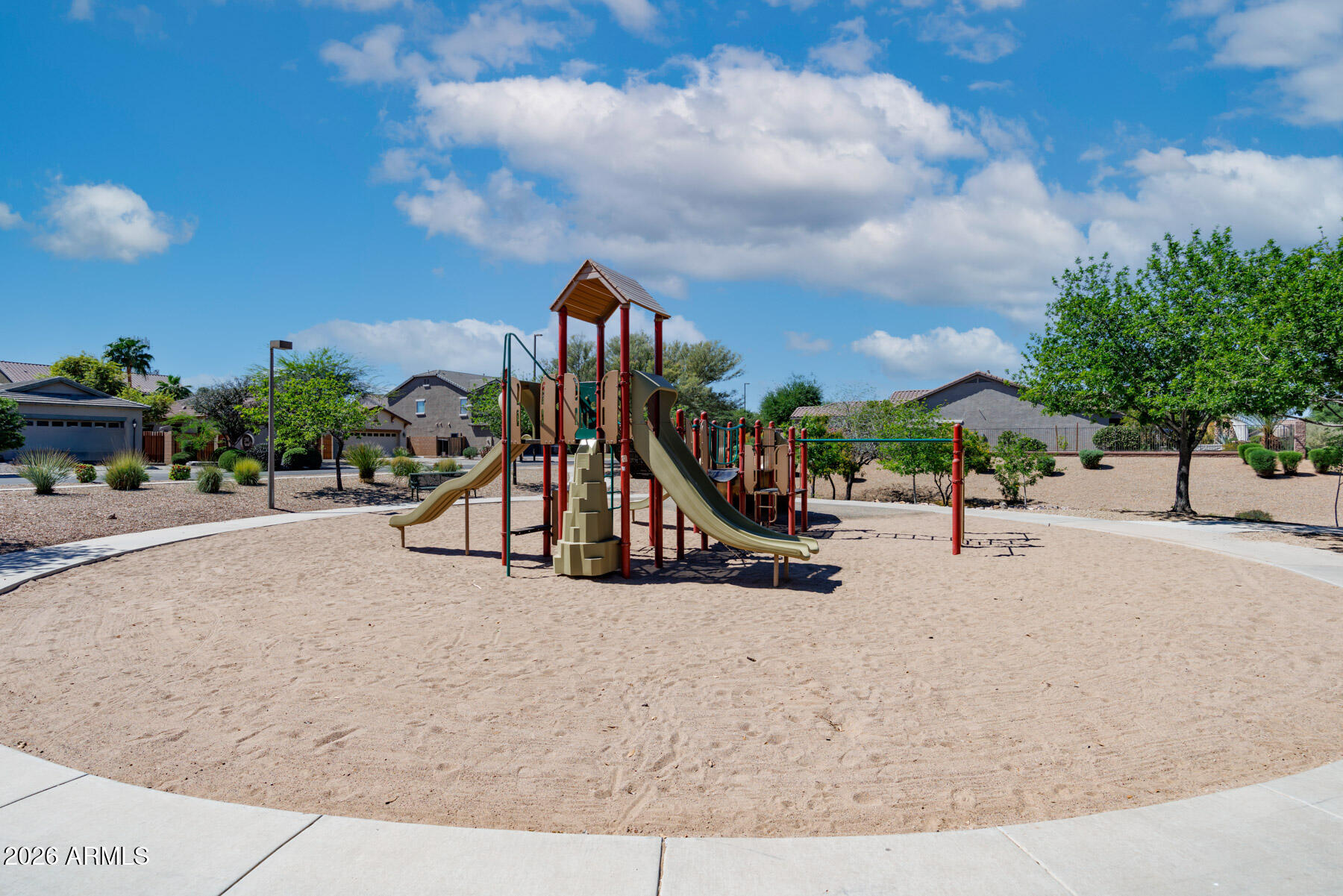3167 East Powell Way Gilbert, AZ 85298 - Photo 38 of 39 a view of a park with swings and slides