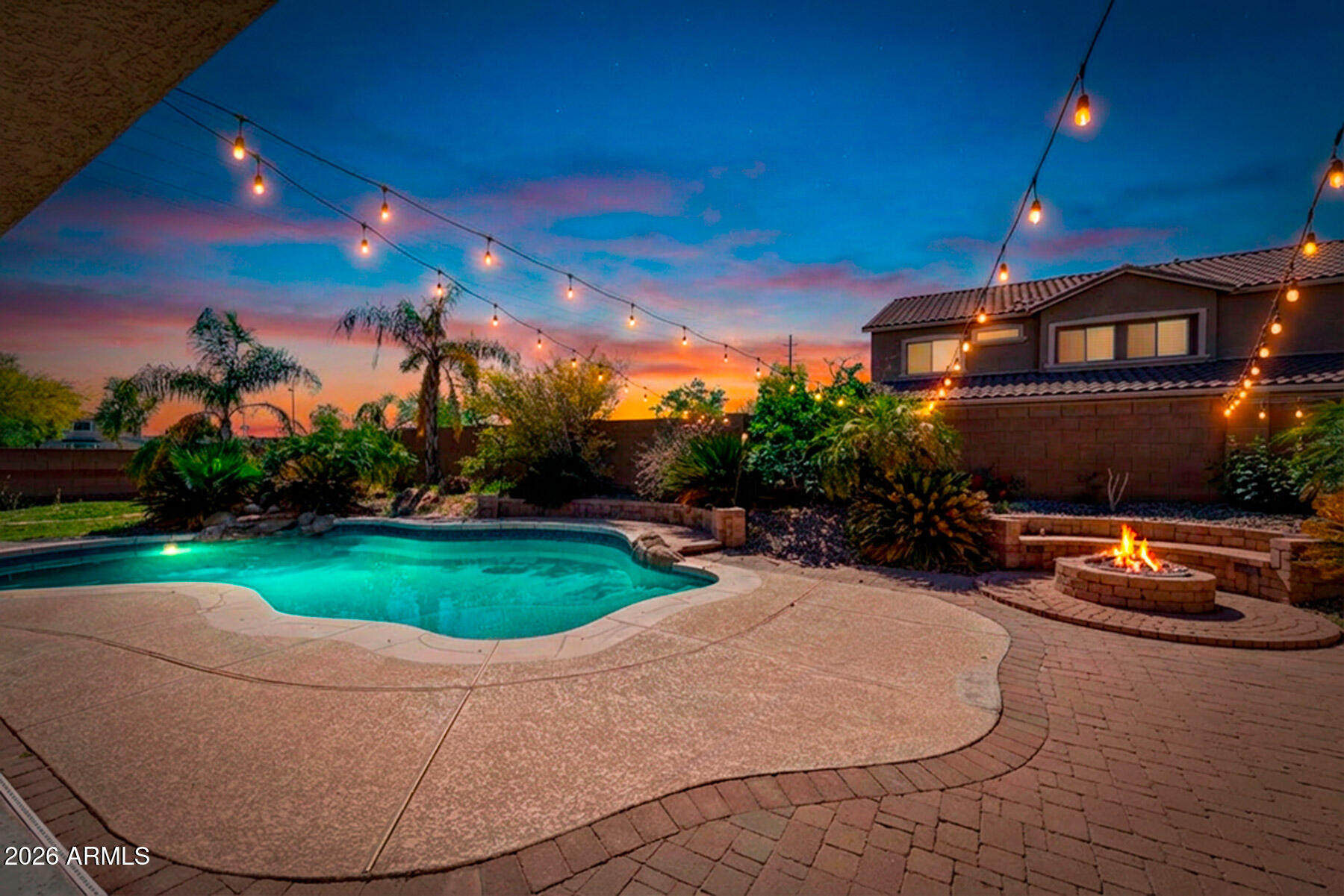 3167 East Powell Way Gilbert, AZ 85298 - Photo 3 of 39 a view of a swimming pool with a patio