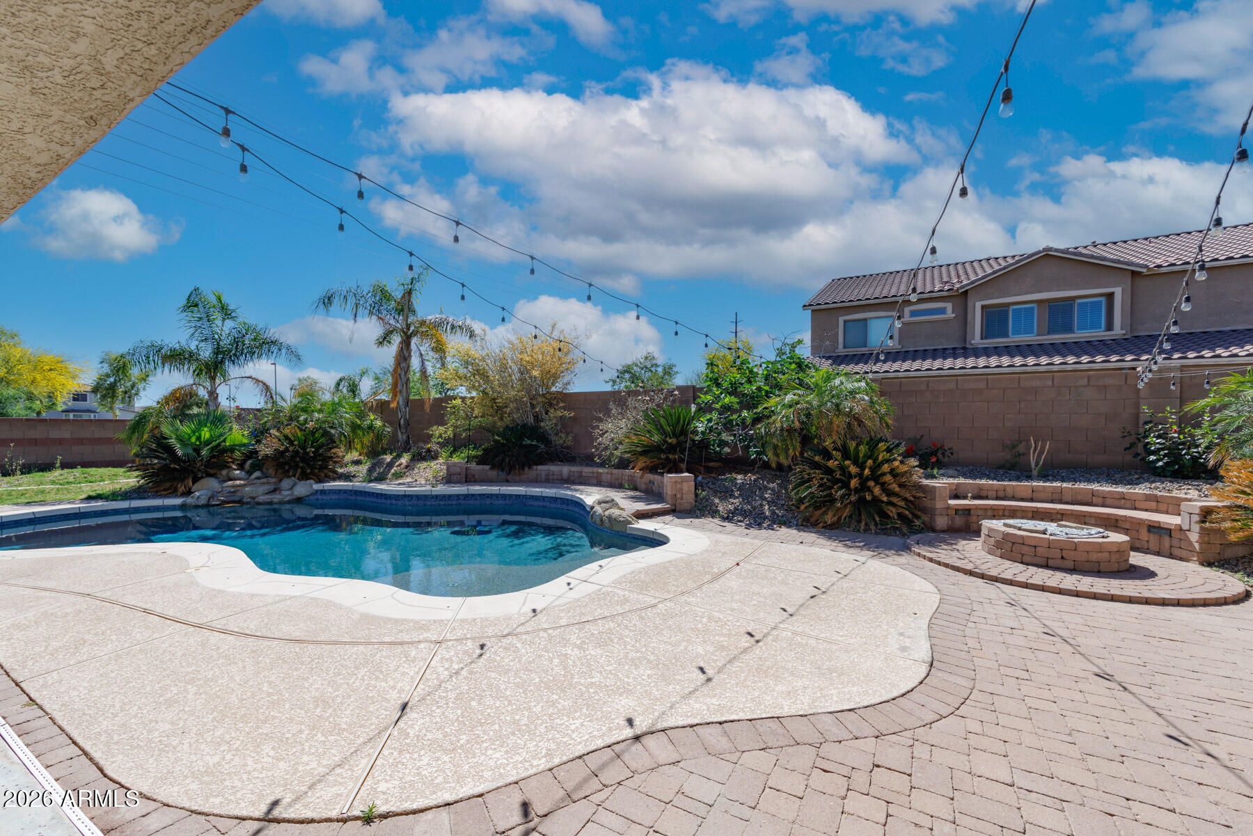 3167 East Powell Way Gilbert, AZ 85298 - Photo 5 of 39 a view of a swimming pool with a patio
