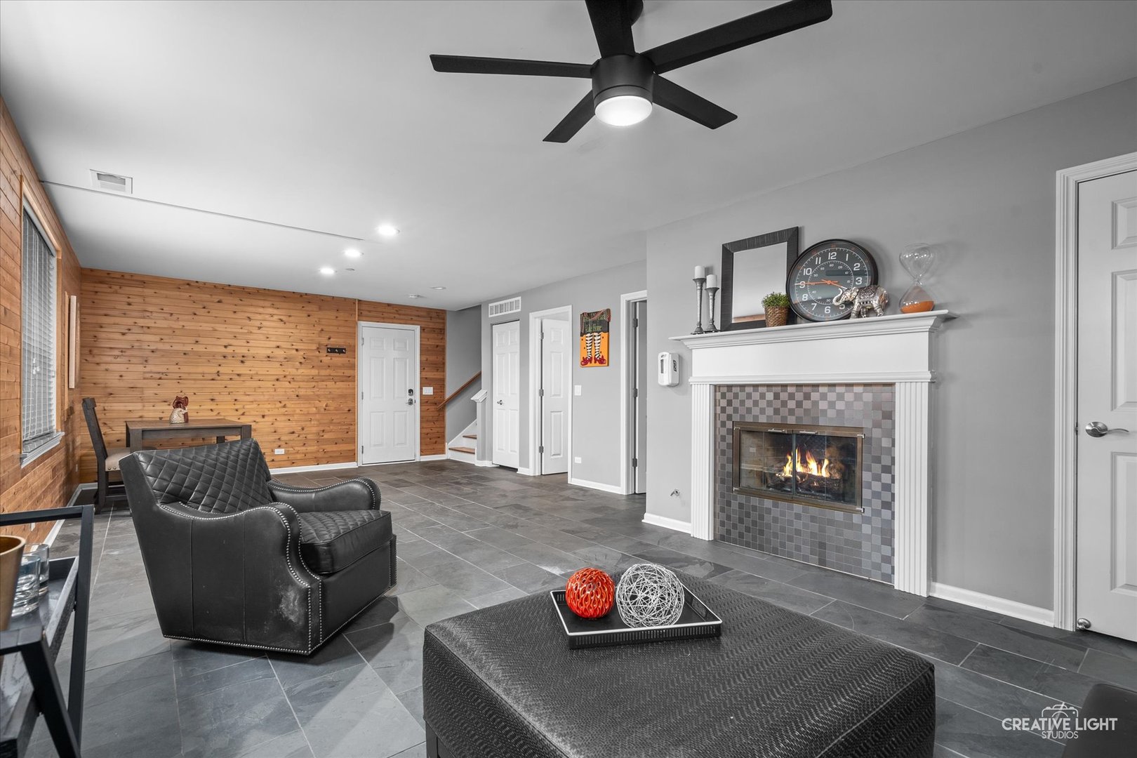 394 Broadmoor Lane Bartlett, IL 60103 - Photo 14 of 18 a living room with furniture and a fireplace