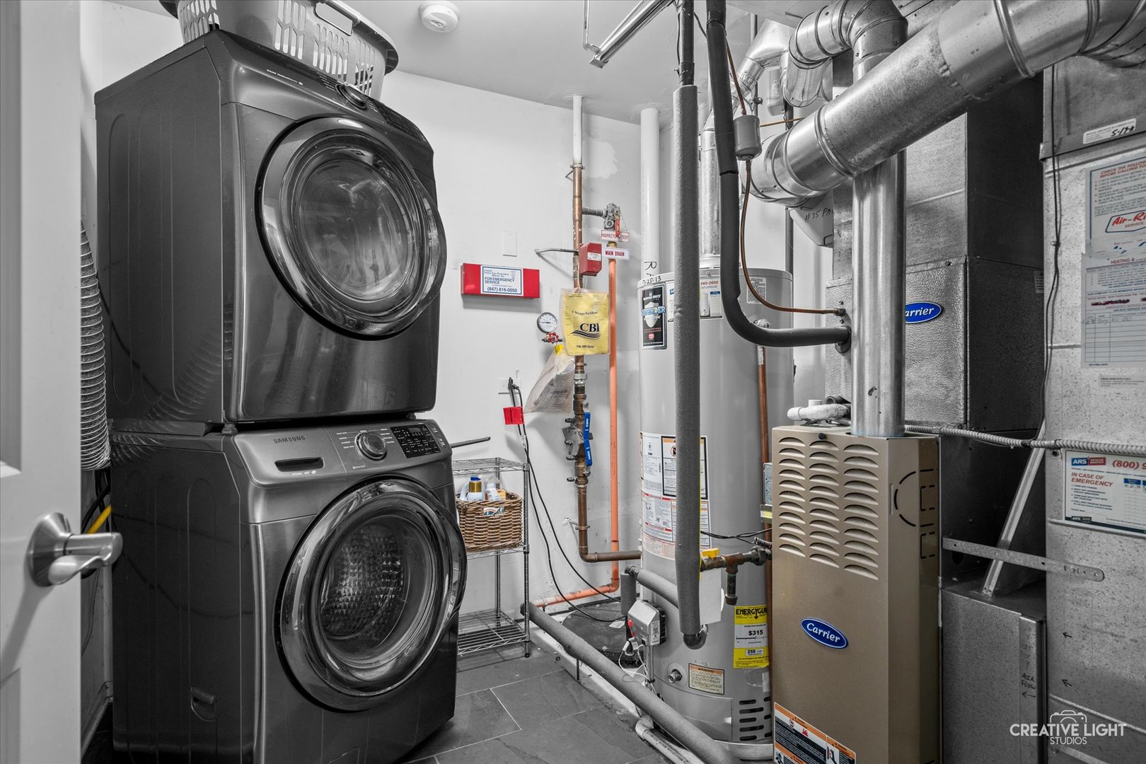 394 Broadmoor Lane Bartlett, IL 60103 - Photo 17 of 18 a utility room with dryer and washer