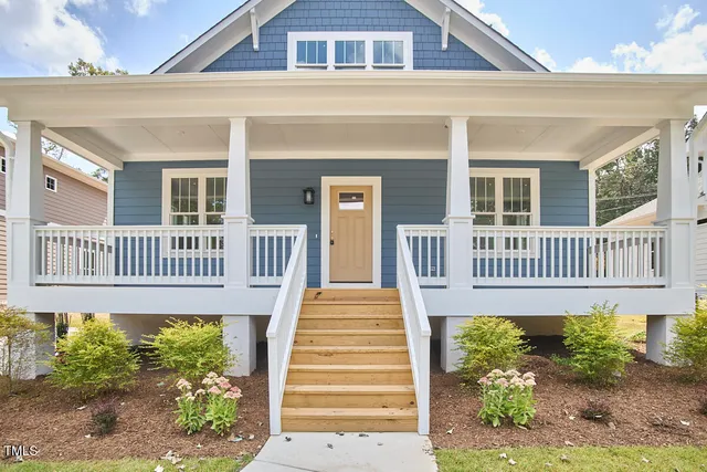 a view of a living room and a balcony