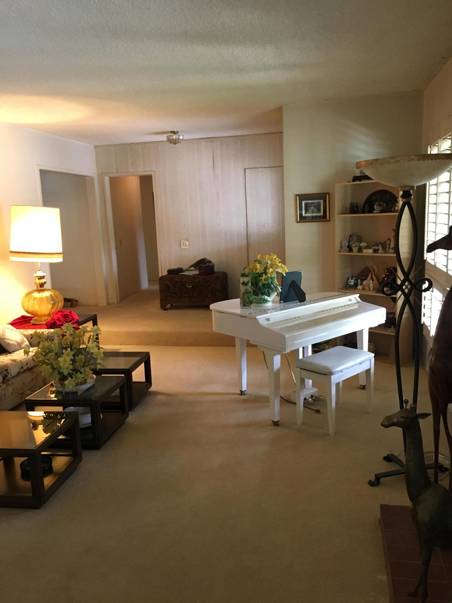 1065 Warwick Avenue Thousand Oaks, CA 91360 - Photo 4 of 15 a gym room with furniture and a table