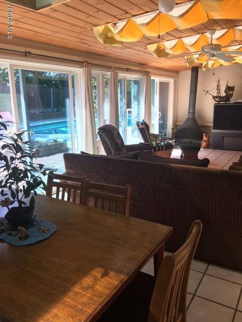 1065 Warwick Avenue Thousand Oaks, CA 91360 - Photo 9 of 15 a view of a dining room with furniture window and outside view