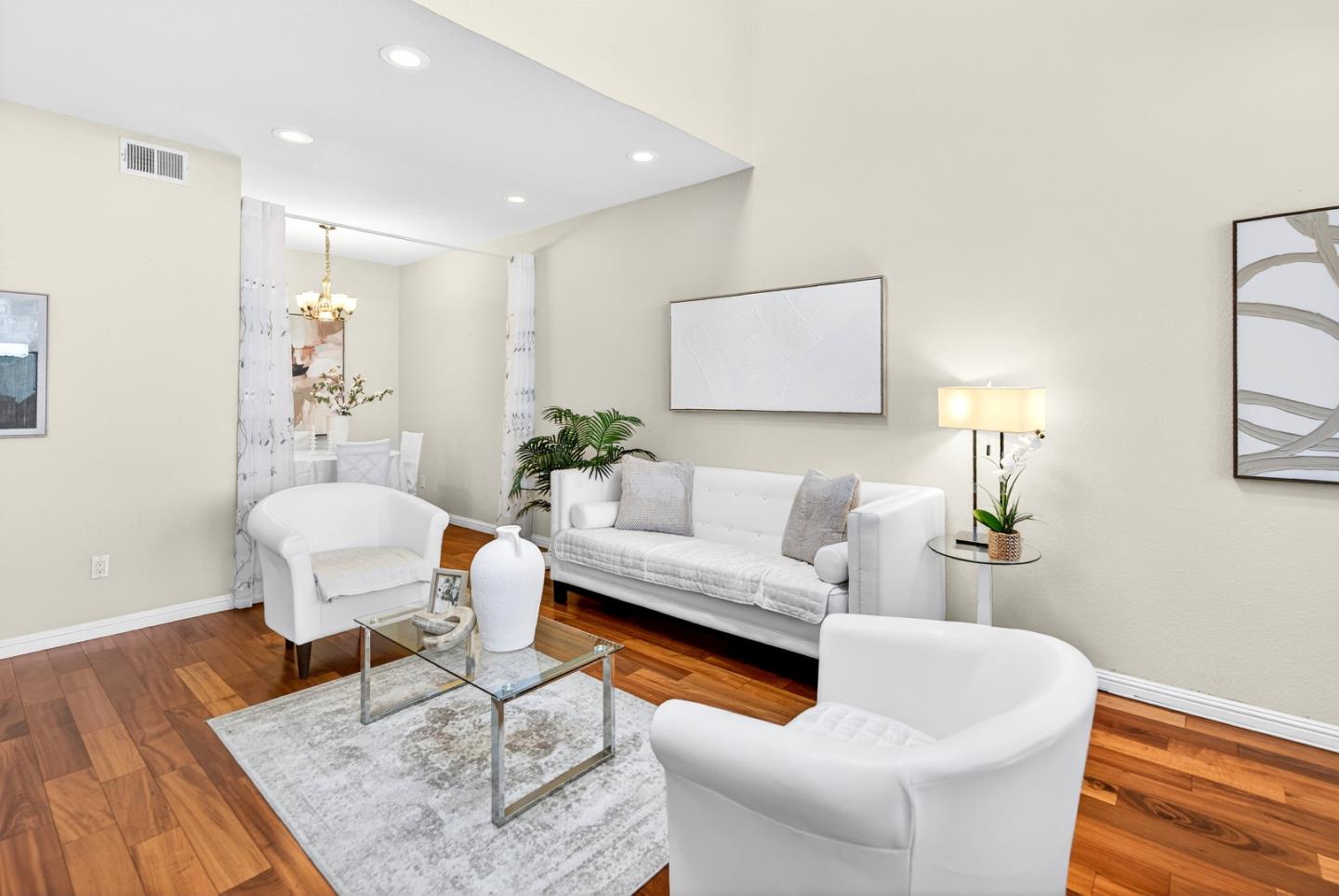 22330 Homestead Road, Unit 214 Cupertino, CA 95014 - Photo 11 of 35 a living room with furniture and a wooden floor
