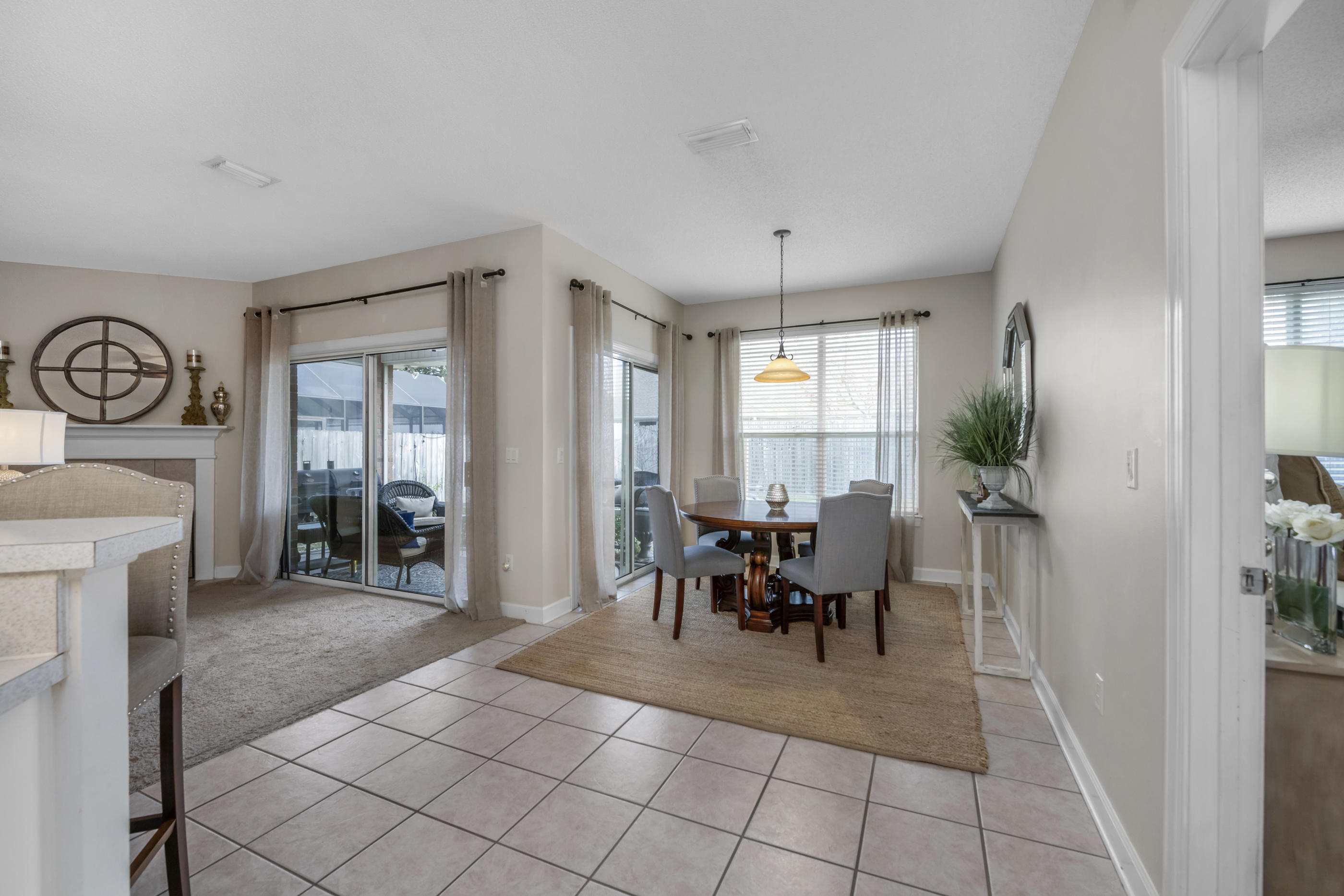 4061 Drifting Sand Trail Destin, FL 32541 - Photo 25 of 32 a dining room with furniture and window