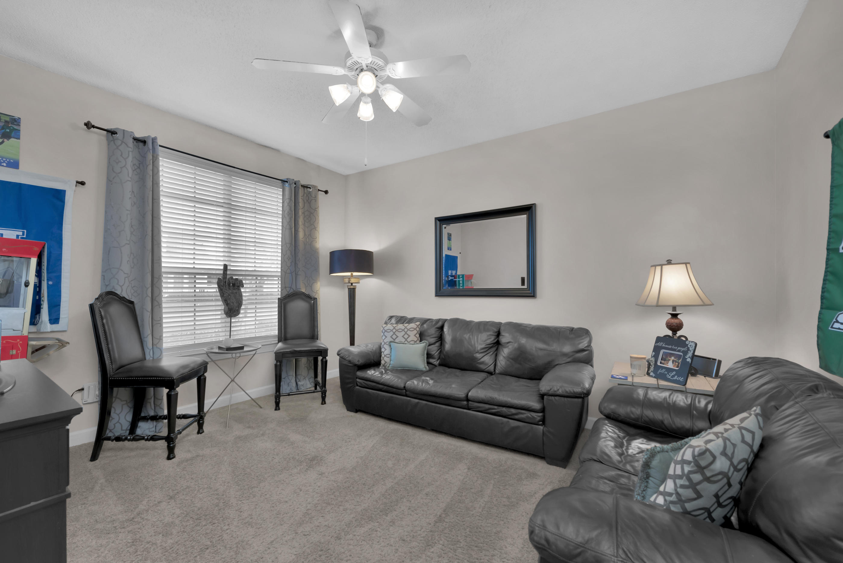 4061 Drifting Sand Trail Destin, FL 32541 - Photo 5 of 32 a living room with furniture fireplace and a large window