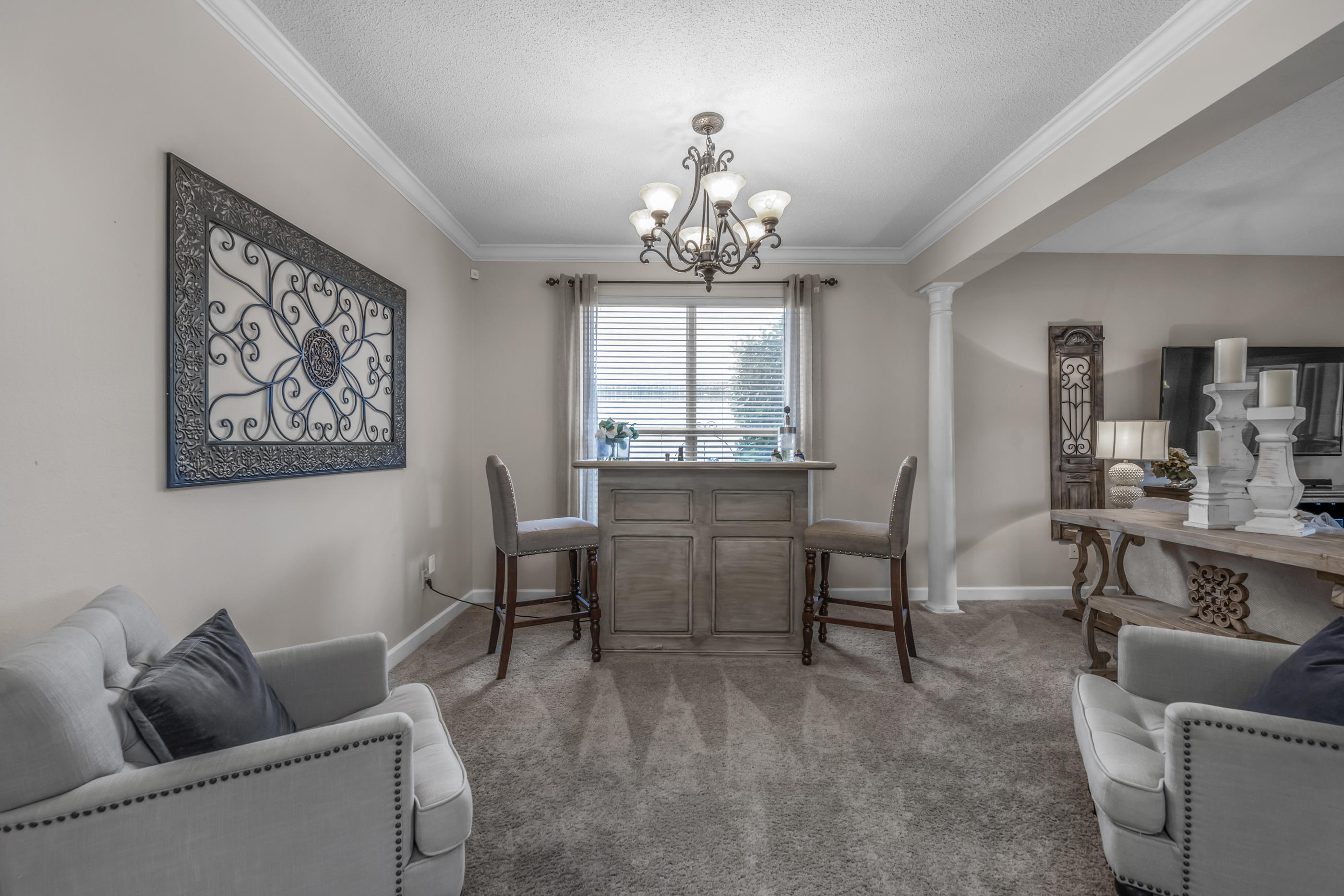 4061 Drifting Sand Trail Destin, FL 32541 - Photo 7 of 32 a living room with furniture and a chandelier