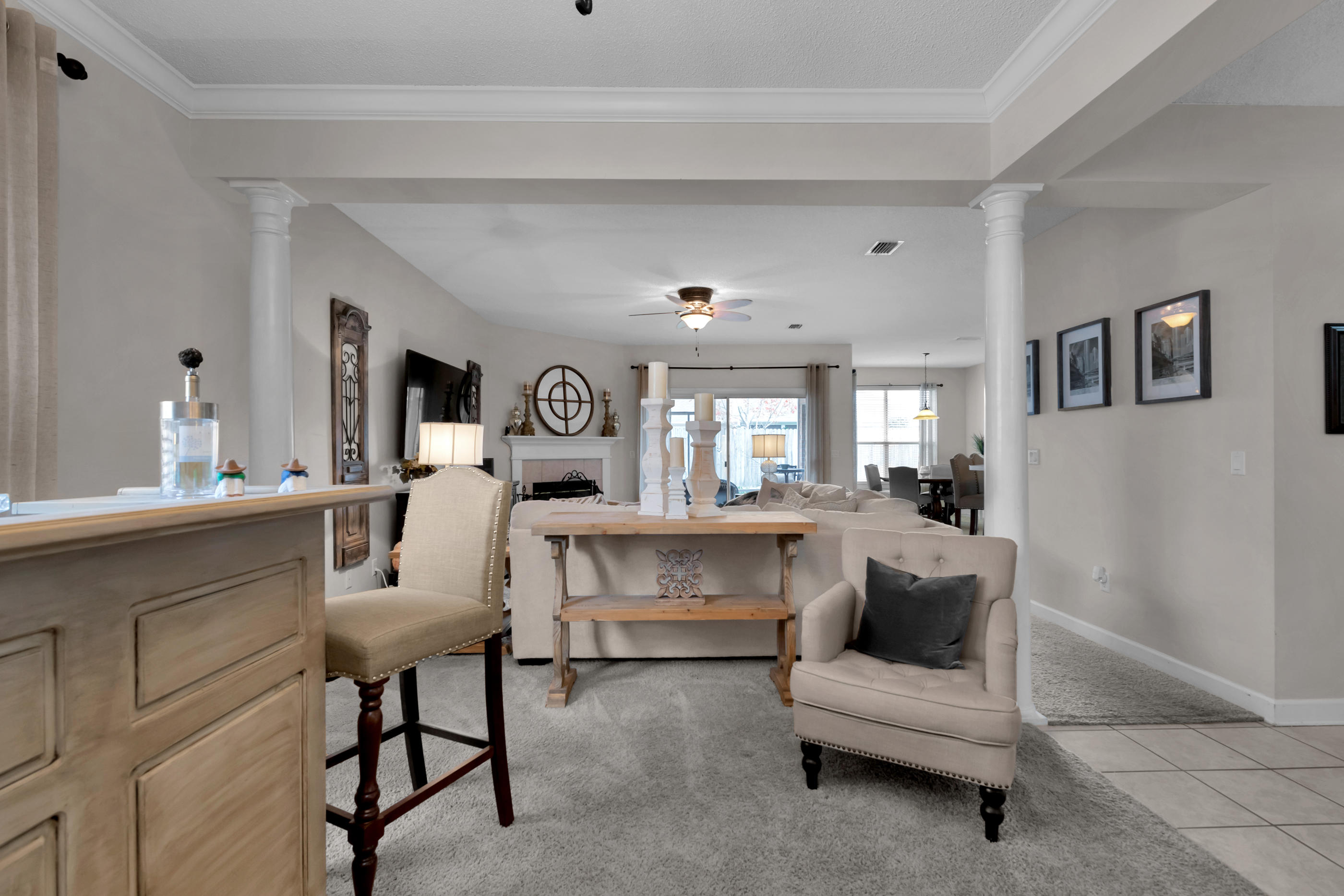 4061 Drifting Sand Trail Destin, FL 32541 - Photo 9 of 32 a living room with furniture and a painting on the wall