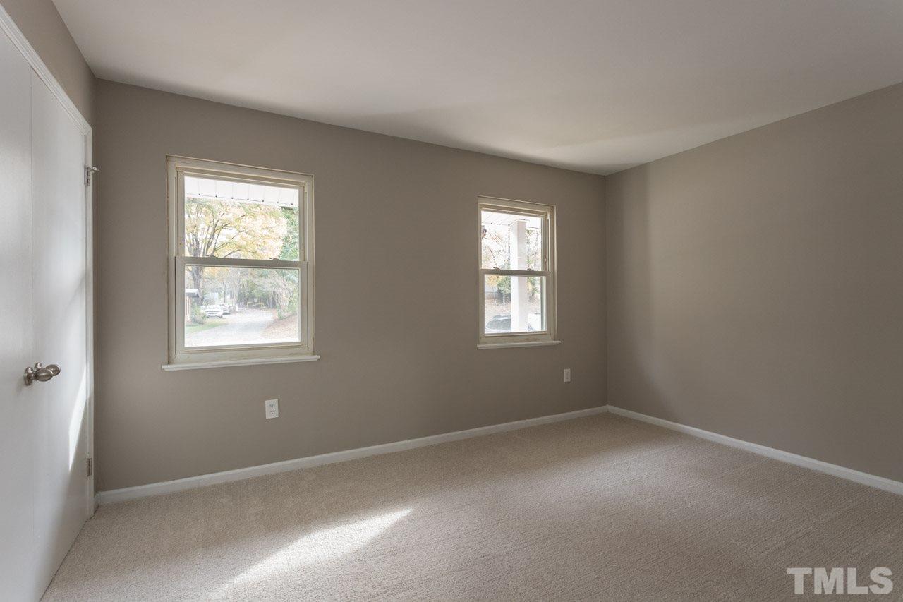 2708 Sanderford Road Raleigh, NC 27610 - Photo 14 of 21 an empty room with windows