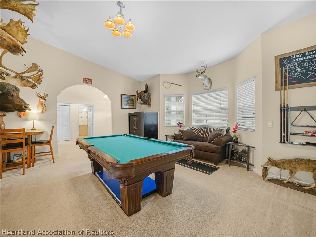 5721 Golden Road Sebring, FL 33875 - Photo 13 of 42 Situated off the foyer; this formal dining room is being used as a game room by the current owners. Notice the breakfast nook of this home is roomy enough for a full-sized dining table and hutch