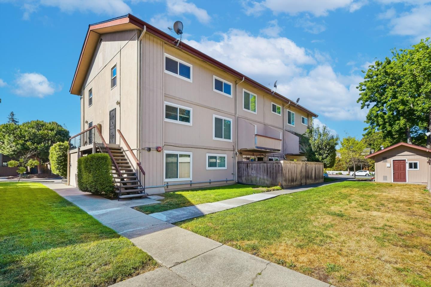 701 North Rengstorff Avenue, Unit 7 Mountain View, CA 94043 - Photo 2 of 32 a front view of house with yard