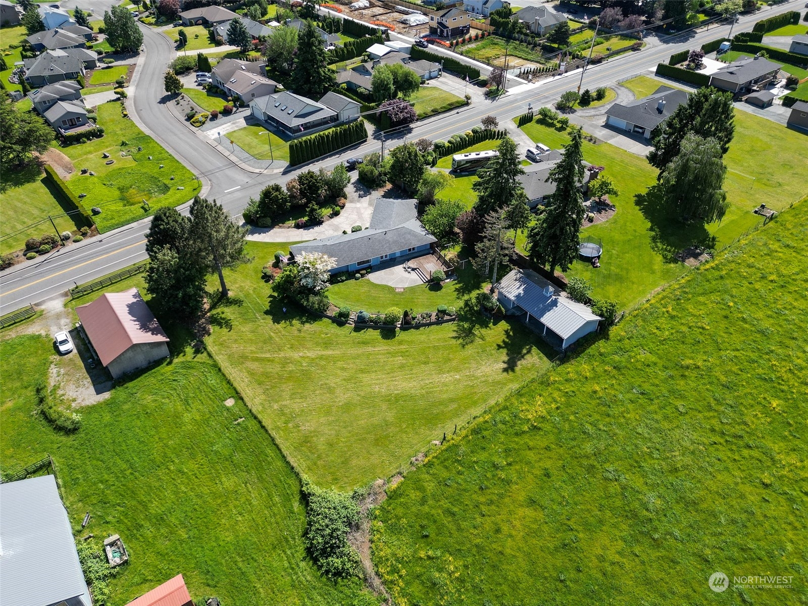 16925 Peterson Road Burlington, WA 98233 - Photo 9 of 36 an aerial view of residential houses with outdoor space