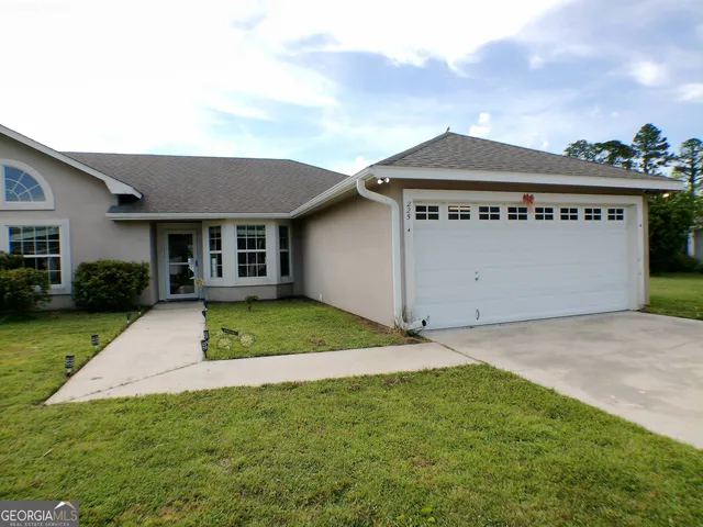 a view of outdoor space yard and front view of a house