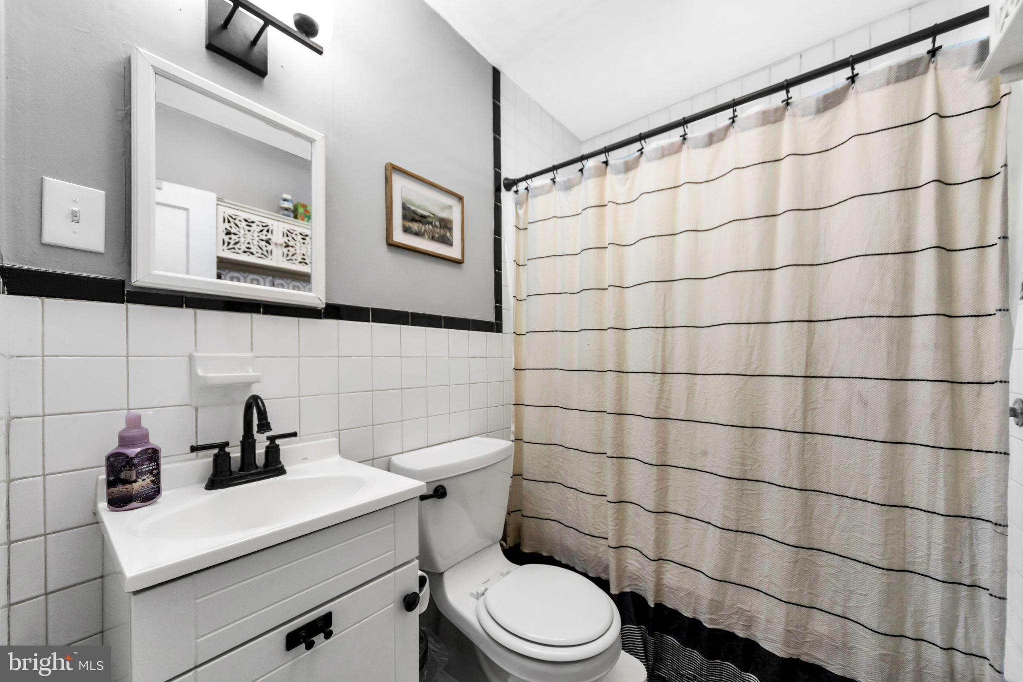 205 Warren Avenue Bellmawr, NJ 08031 - Photo 14 of 25 Chic bathroom with modern touches.