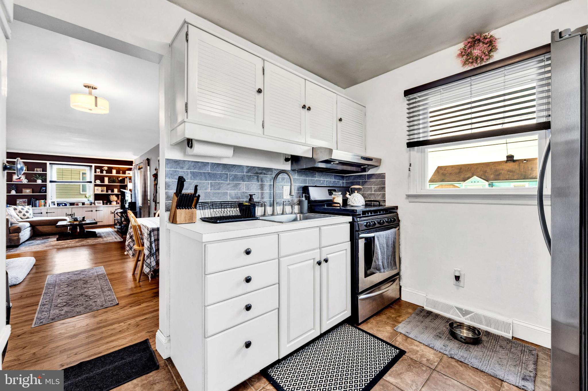 205 Warren Avenue Bellmawr, NJ 08031 - Photo 9 of 25 Charming kitchen with modern touches.