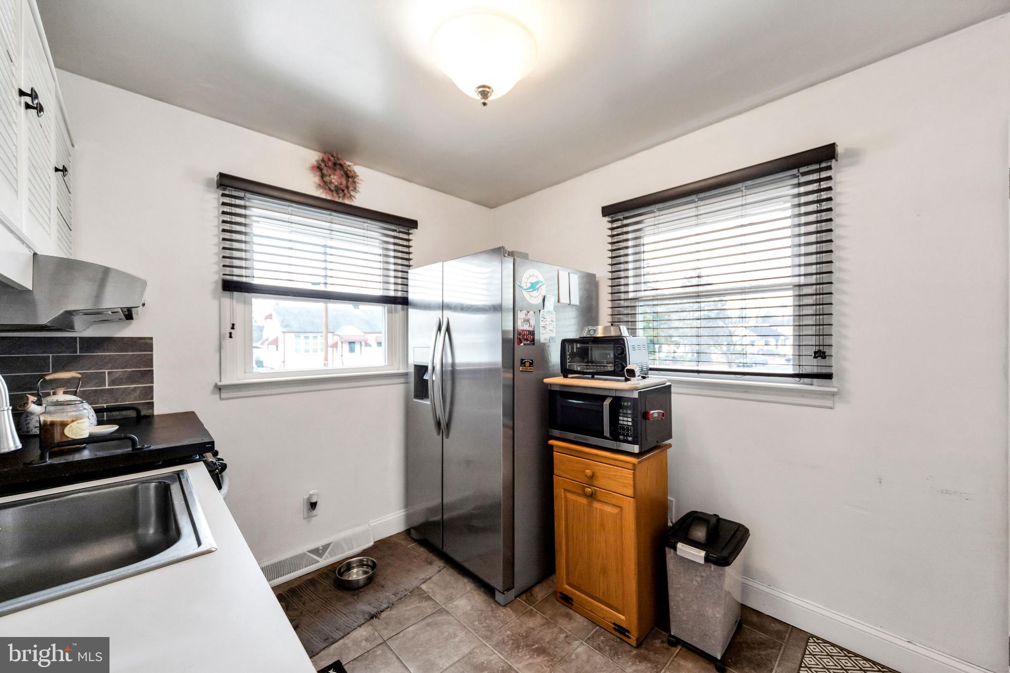 205 Warren Avenue Bellmawr, NJ 08031 - Photo 10 of 25 Bright and functional kitchen space.