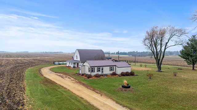 a view of a house with a big yard
