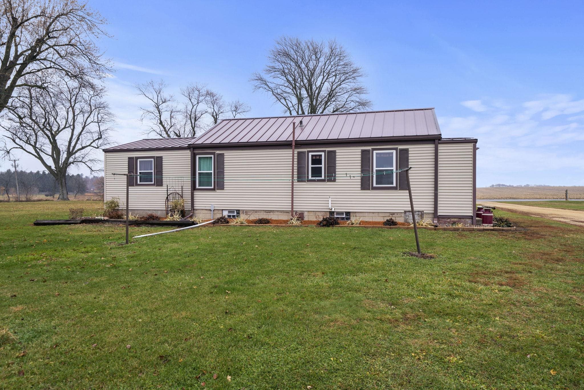 1684 North Mt Morris Road Mount Morris, IL 61054 - Photo 11 of 44 a front view of house with yard and trees