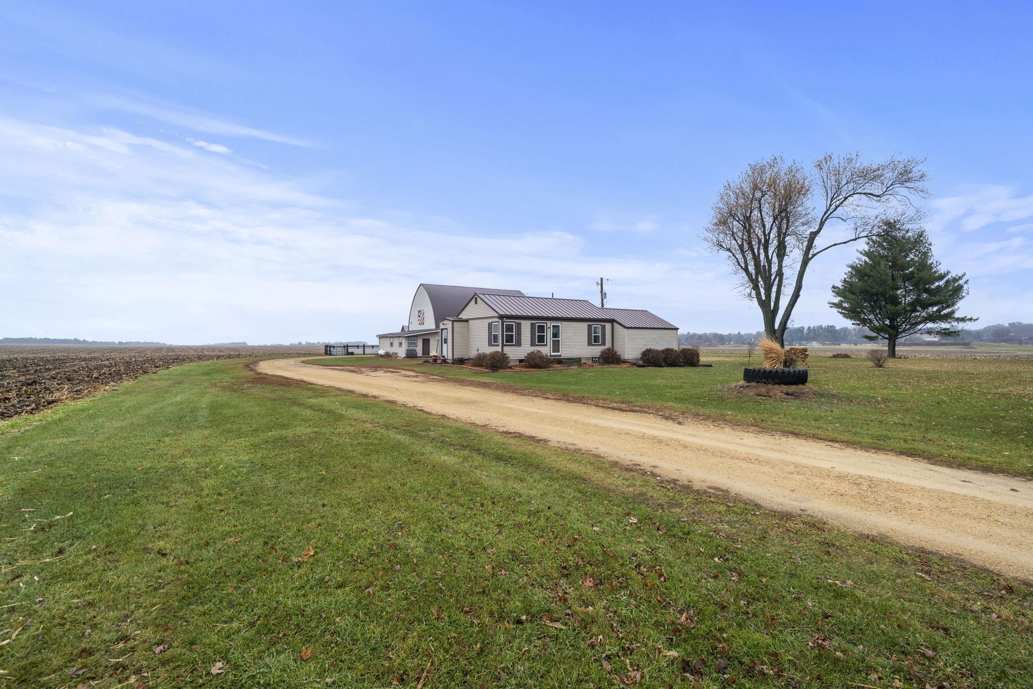 1684 North Mt Morris Road Mount Morris, IL 61054 - Photo 15 of 44 a view of a house with a big yard