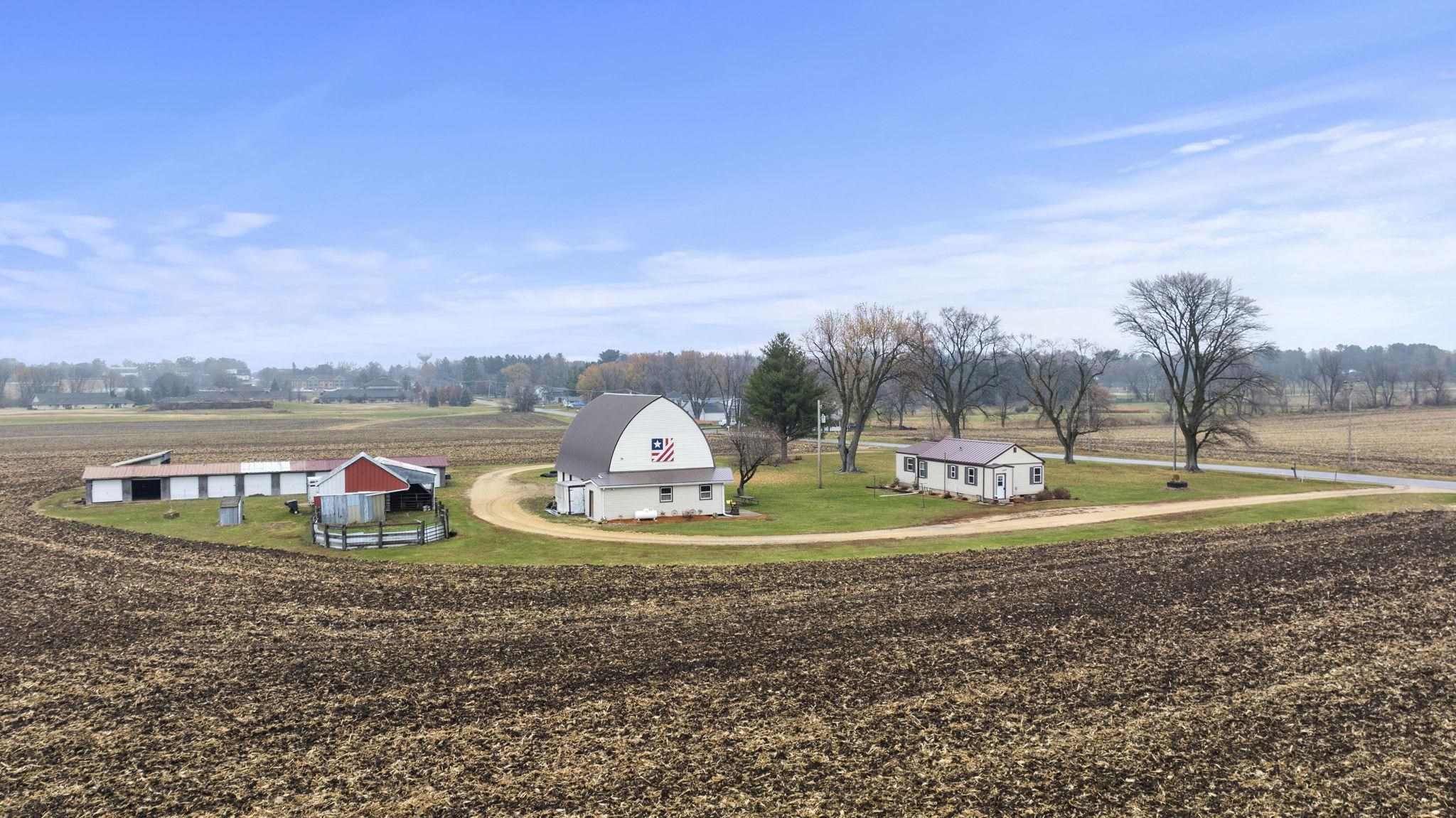 1684 North Mt Morris Road Mount Morris, IL 61054 - Photo 2 of 44 a view of a lake with houses