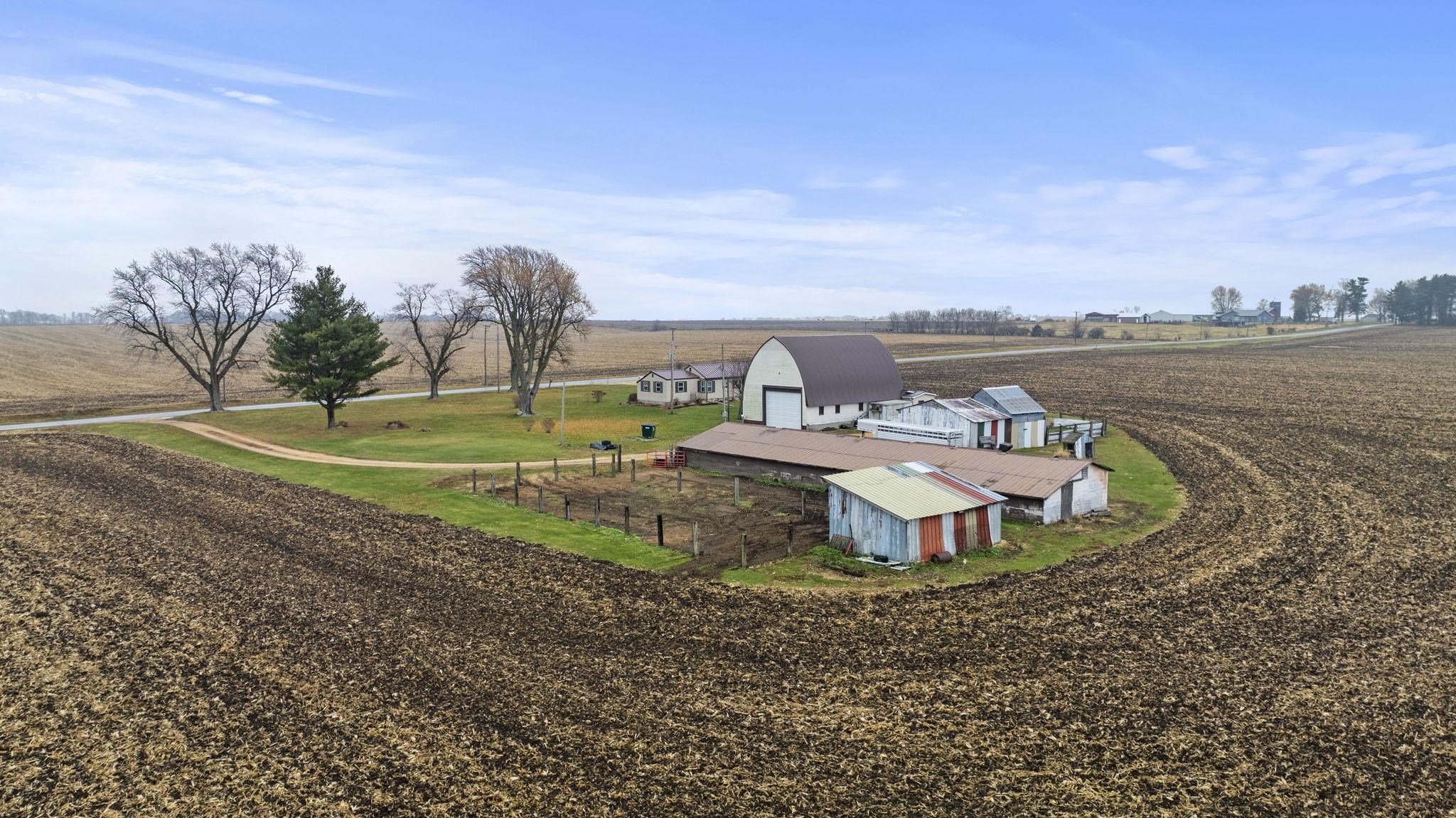 1684 North Mt Morris Road Mount Morris, IL 61054 - Photo 4 of 44 a view of a lake with a yard