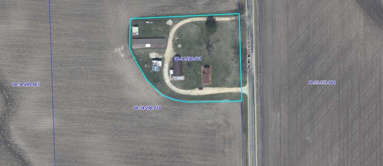 1684 North Mt Morris Road Mount Morris, IL 61054 - Photo 44 of 44 a bathroom with a mirror