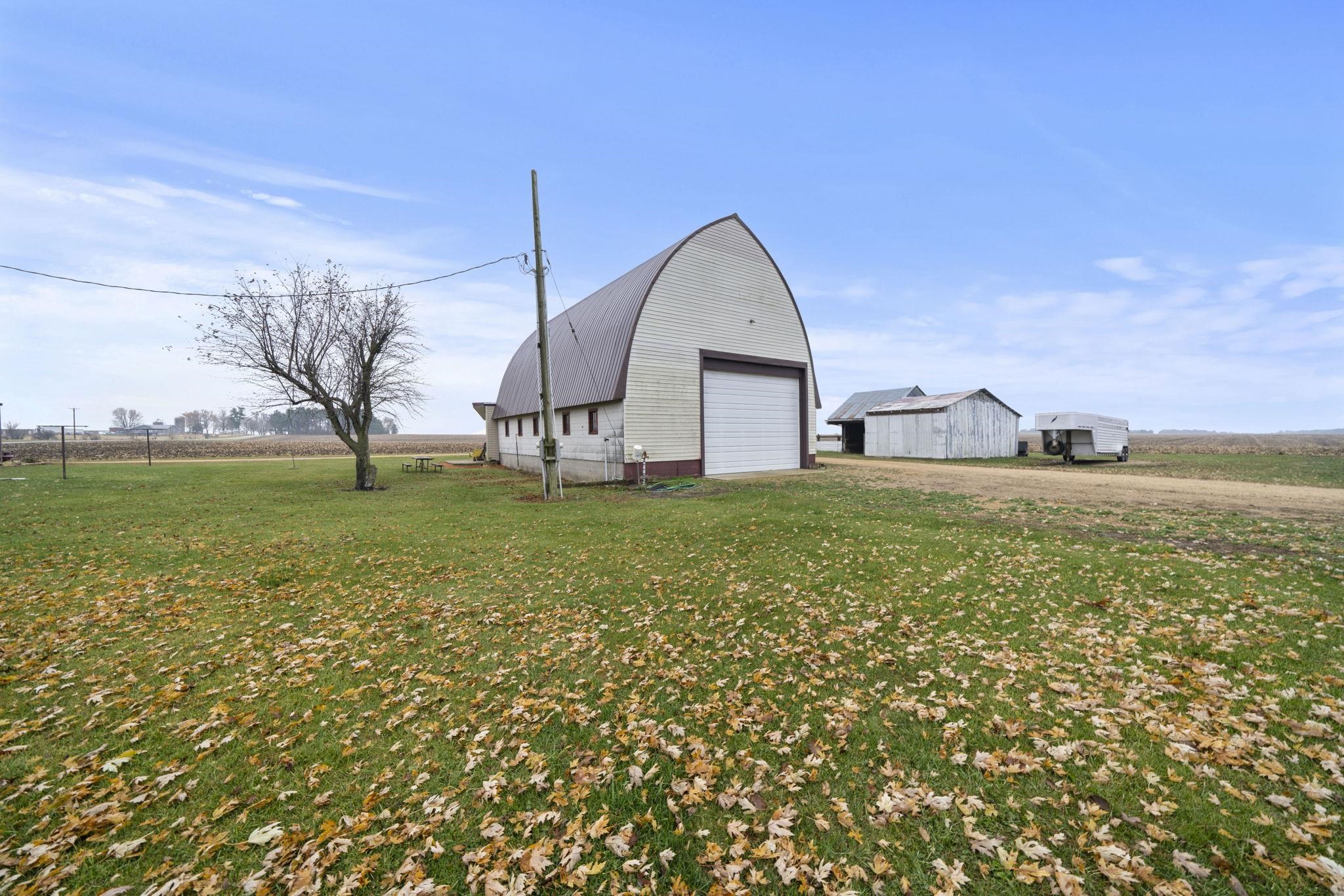1684 North Mt Morris Road Mount Morris, IL 61054 - Photo 9 of 44 a view of a house with a yard