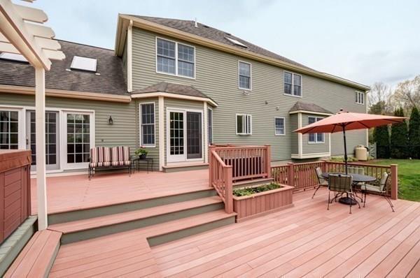32 Farm Road Bolton, MA 01740 - Photo 25 of 30 a view of a house with porch and wooden floor