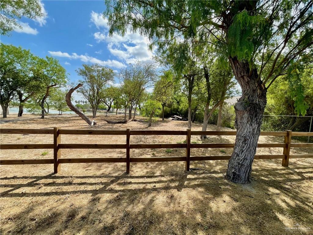 844 West Estero Drive Progreso Lakes, TX 78596 - Photo 5 of 6 a view of outdoor space with trees