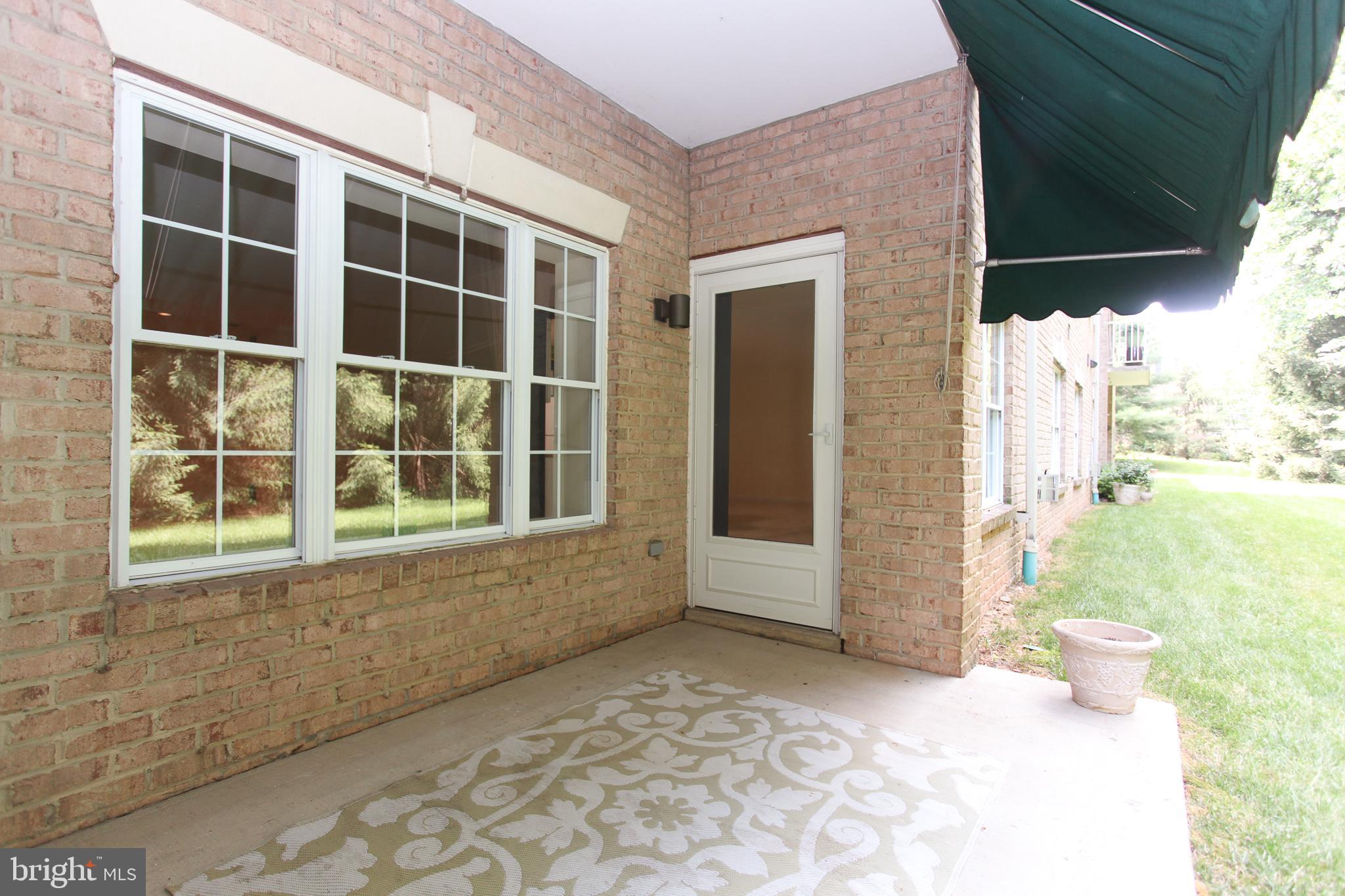 12350 Rosslare Ridge Road, Unit 103 Lutherville-Timonium, MD 21093 - Photo 23 of 24 Entrance from Patio into Family Room