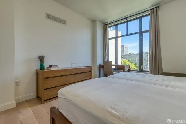 a view of a bathroom with a tub and window