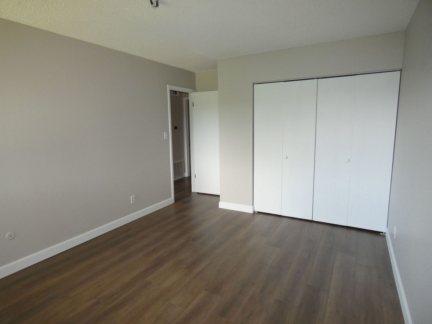 1501 Woodbridge Road, Unit 3C Joliet, IL 60436 - Photo 14 of 24 a view of an empty room with wooden floor