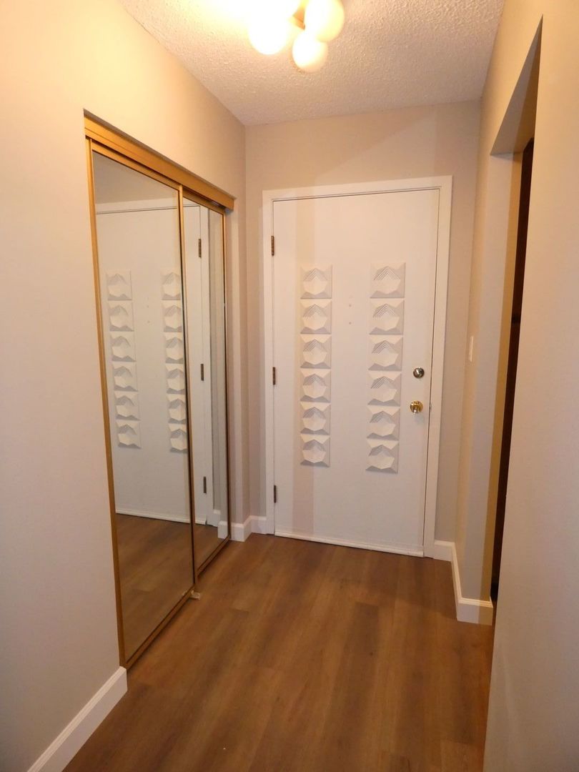 1501 Woodbridge Road, Unit 3C Joliet, IL 60436 - Photo 3 of 24 an empty room with closet area