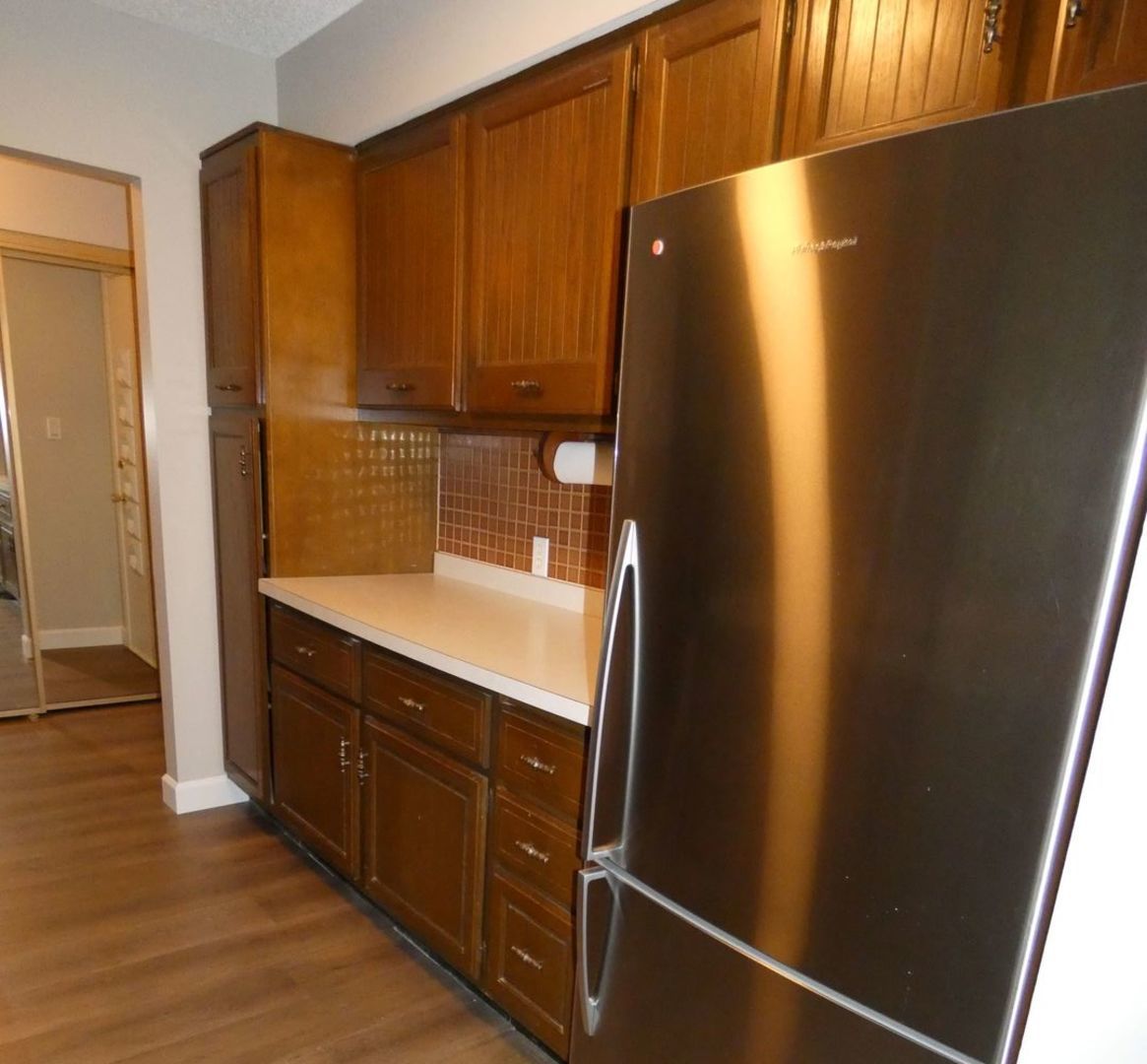 1501 Woodbridge Road, Unit 3C Joliet, IL 60436 - Photo 6 of 24 a bathroom with a sink and a mirror