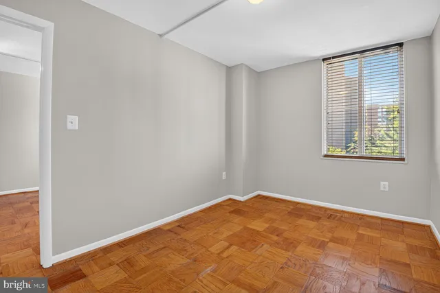 a view of an empty room with a window