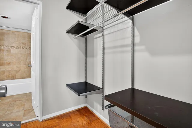 a kitchen with a refrigerator and a stove