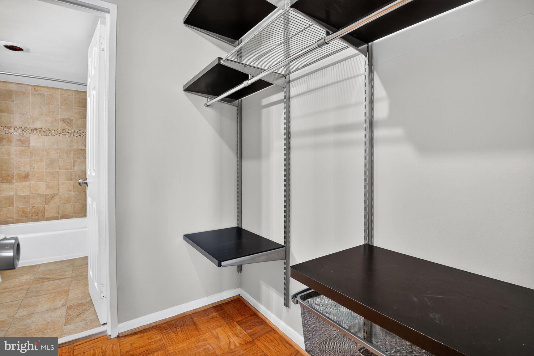 2939 Van Ness Street Northwest, Unit 941 Washington, DC 20008 - Photo 23 of 42 a kitchen with a refrigerator and a stove