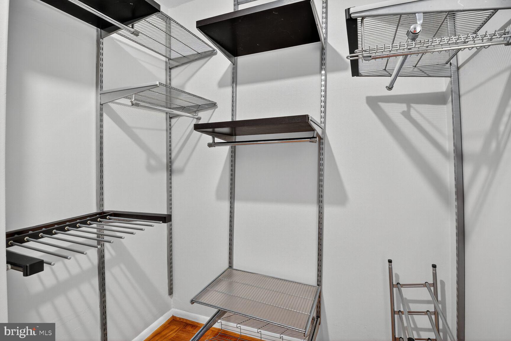 2939 Van Ness Street Northwest, Unit 941 Washington, DC 20008 - Photo 24 of 42 a view of walk in closet with clothes and shoes