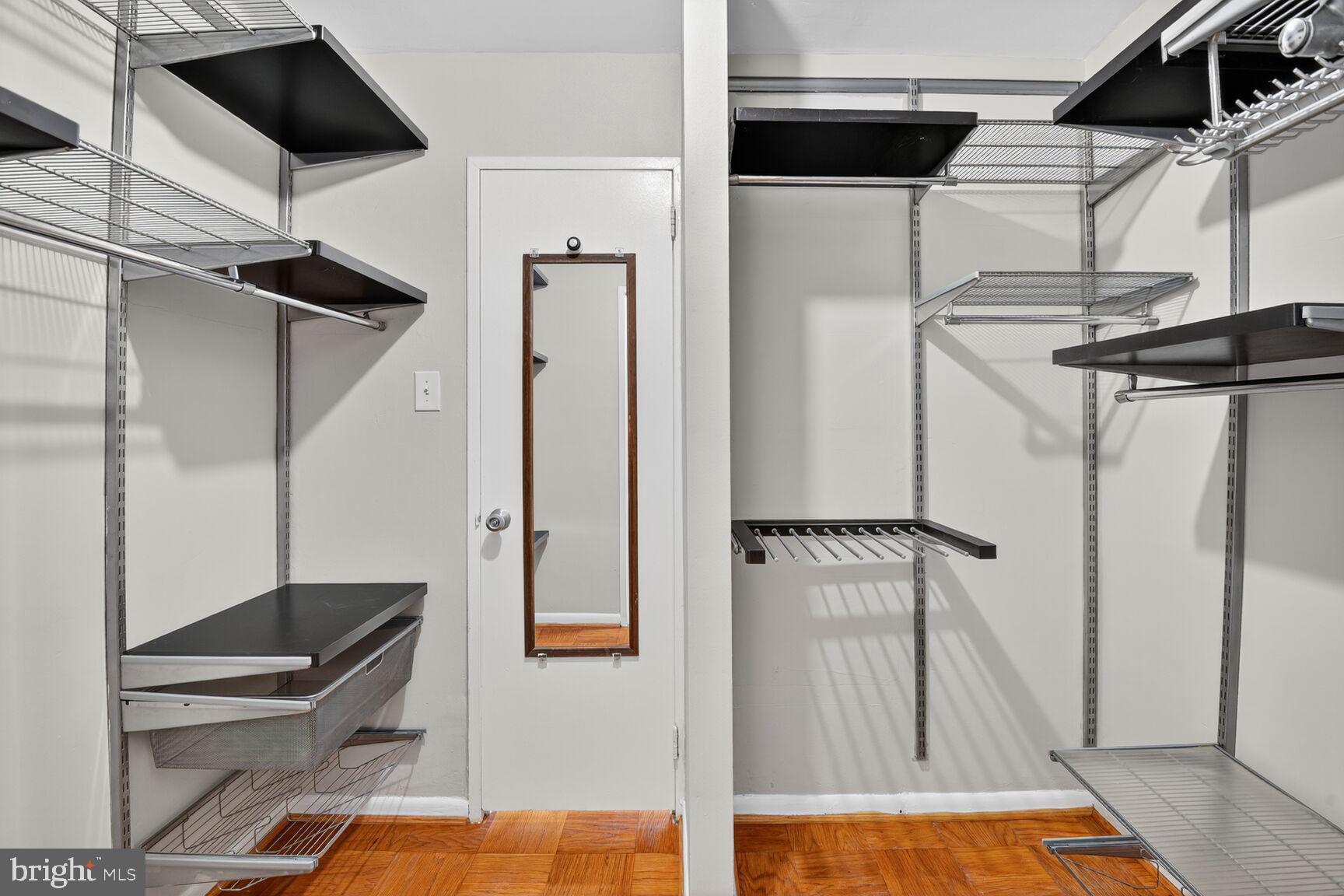 2939 Van Ness Street Northwest, Unit 941 Washington, DC 20008 - Photo 26 of 42 a view of walk in closet with clothes and shoes