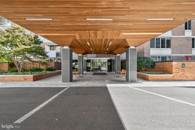 a view of a building with a street