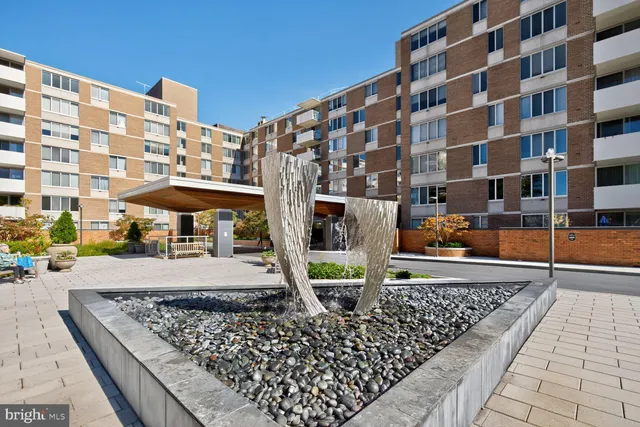 a view of a building with a street