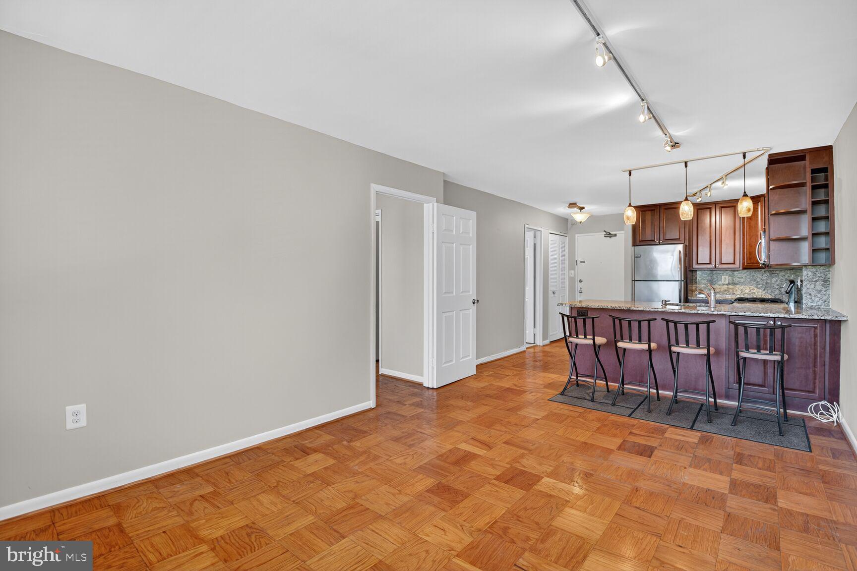 2939 Van Ness Street Northwest, Unit 941 Washington, DC 20008 - Photo 10 of 42 a view of a room with furniture