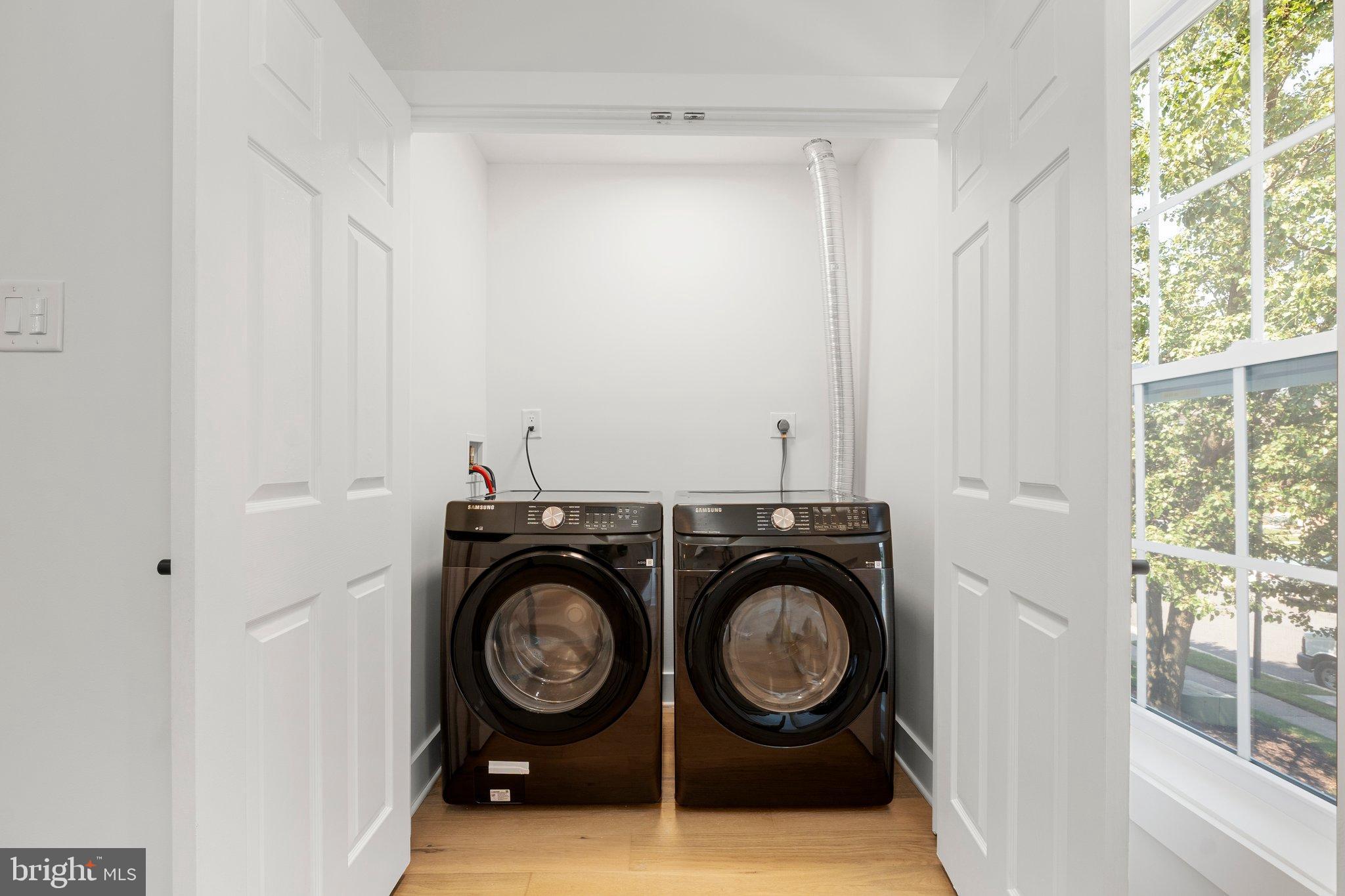 6213 Manchester Way Elkridge, MD 21075 - Photo 28 of 31 a view of washer and dryer in a utility room
