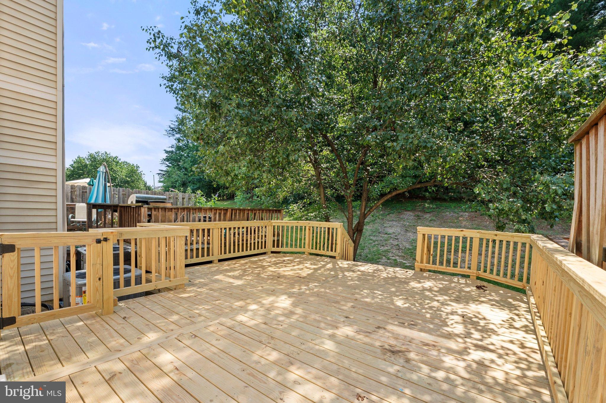 6213 Manchester Way Elkridge, MD 21075 - Photo 31 of 31 a view of a deck with a chair