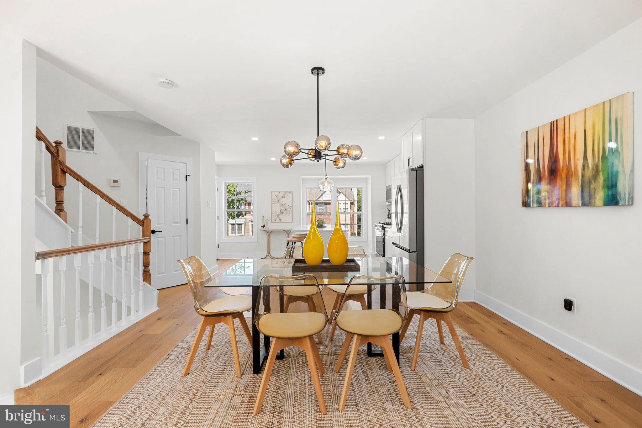 6213 Manchester Way Elkridge, MD 21075 - Photo 6 of 31 a view of a dining room with furniture window and wooden floor